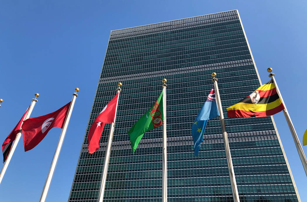 FILE - In this Sept. 28, 2019 file photo, flags fly outside the United Nations headquarters dur ...