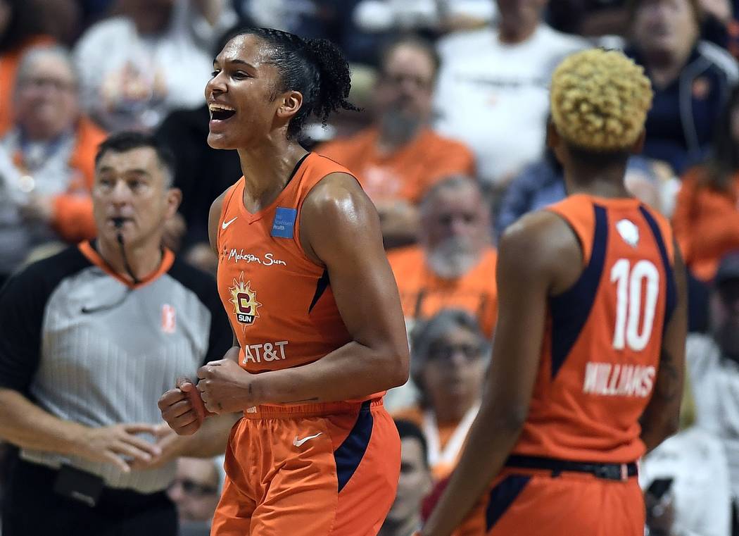 Connecticut Sun's Alyssa Thomas reacts to a play during the first half in Game 4 of basketball' ...