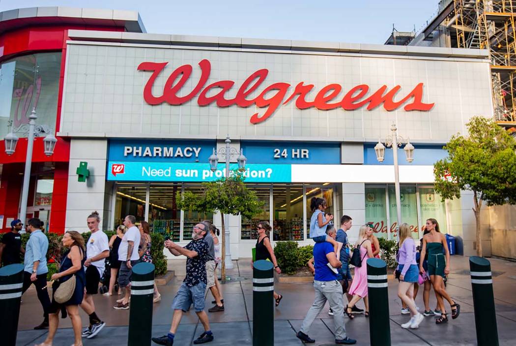 eople walk by the Walgreens on the Las Vegas Strip on Tuesday, Sept. 10, 2019, in Las Vegas. (M ...