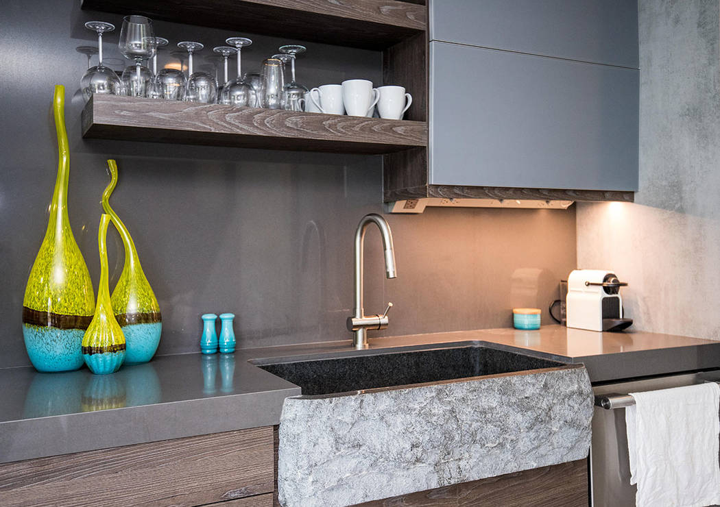 The kitchen features a granite-encased farm sink. (Tonya Harvey/Real Estate Millions)