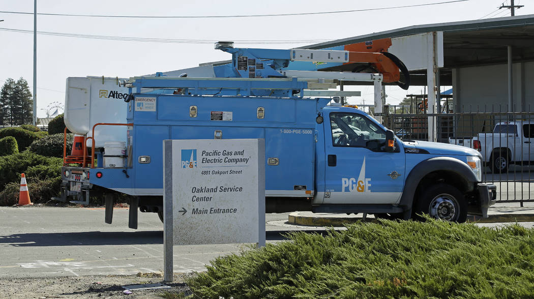 A Pacific Gas & Electric maintenance vehicle pulls into the Oakland service center Wednesda ...