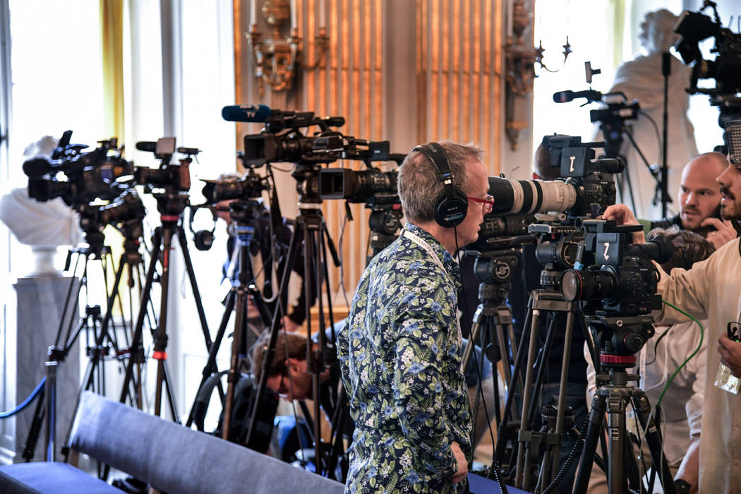 Journalists prepare themselves ahead of the announcement of the winners of the Nobel Prize in L ...