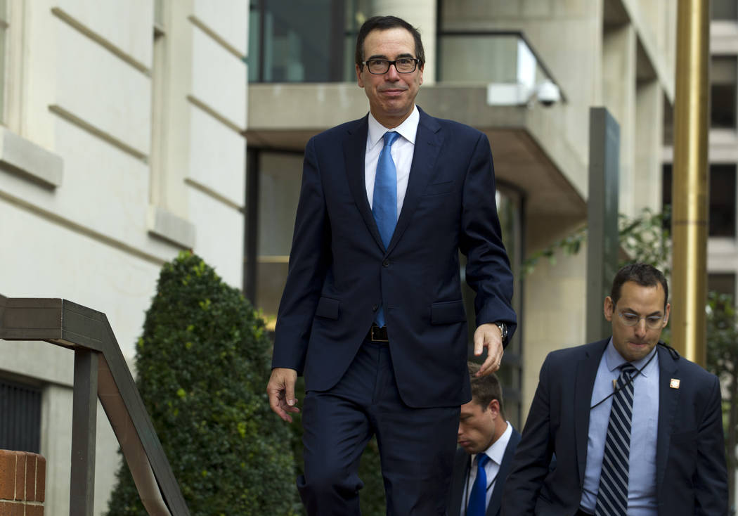 Treasury Secretary Steven Mnuchin arrives to the Office of the United States Trade Representati ...