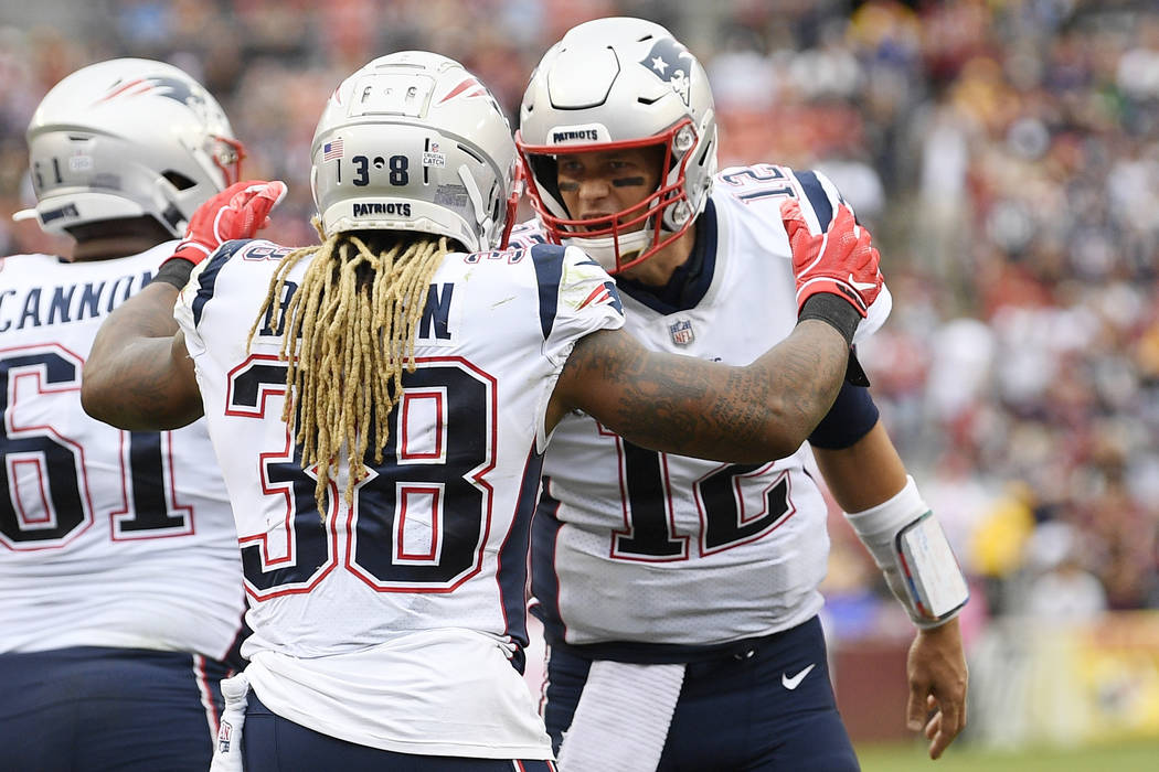 New England Patriots running back Brandon Bolden (38) celebrates his touchdpown with New Englan ...