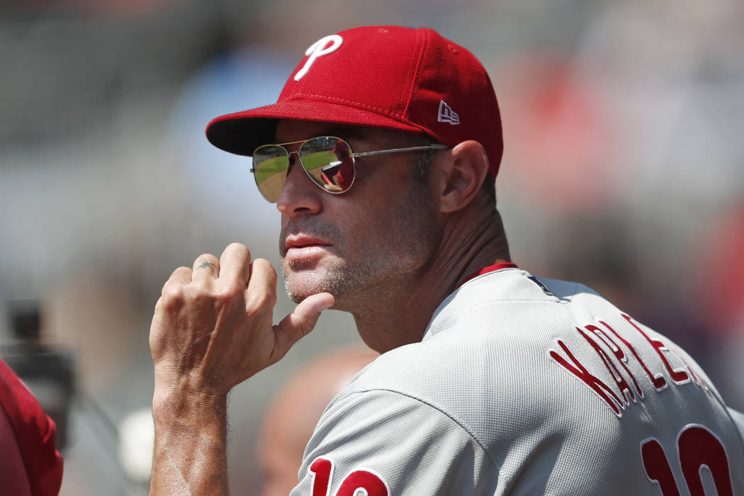 Philadelphia Phillies manager Gabe Kapler (19) watches from the dugout during a baseball game a ...