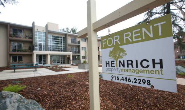 FILE - This Monday, Jan. 8, 2017, file photo shows a "For Rent" sign outside an apart ...