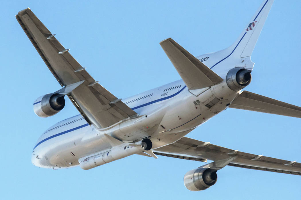 In this Oct. 1, 2019 photo made available by NASA, a Northrop Grumman L-1011 Stargazer aircraft ...