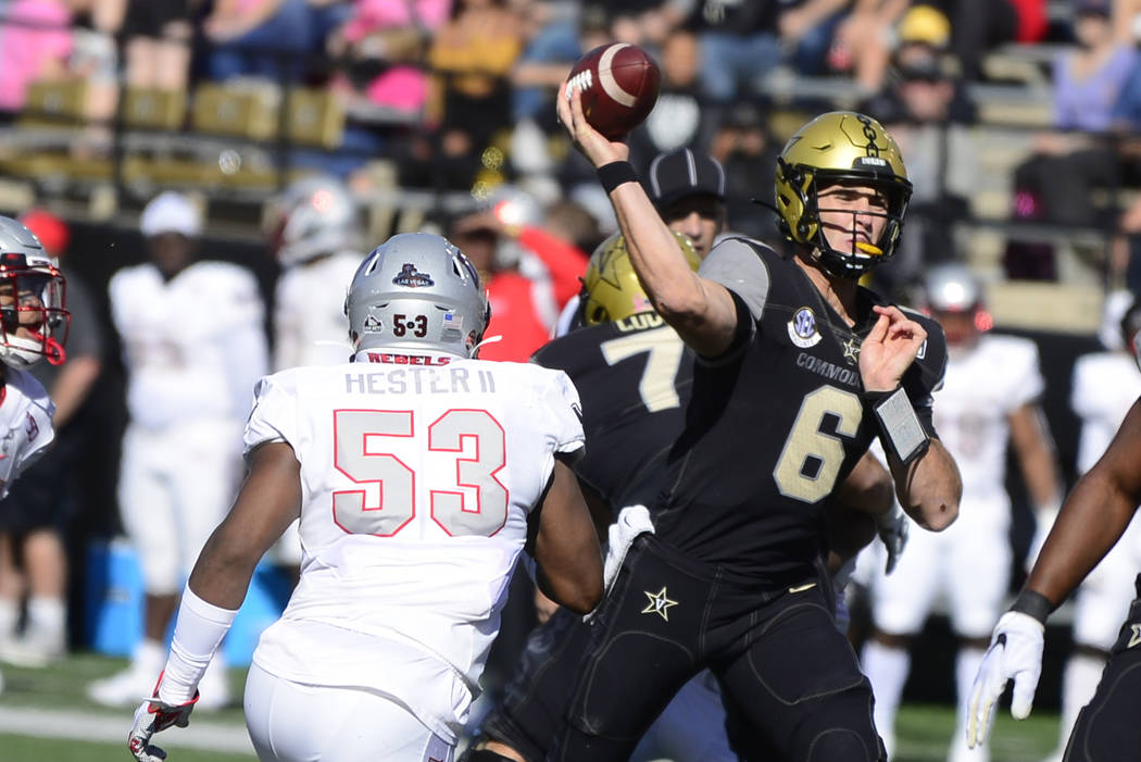 Vanderbilt quarterback Riley Neal (6) throws downfield against UNLV in the first half of an NCA ...