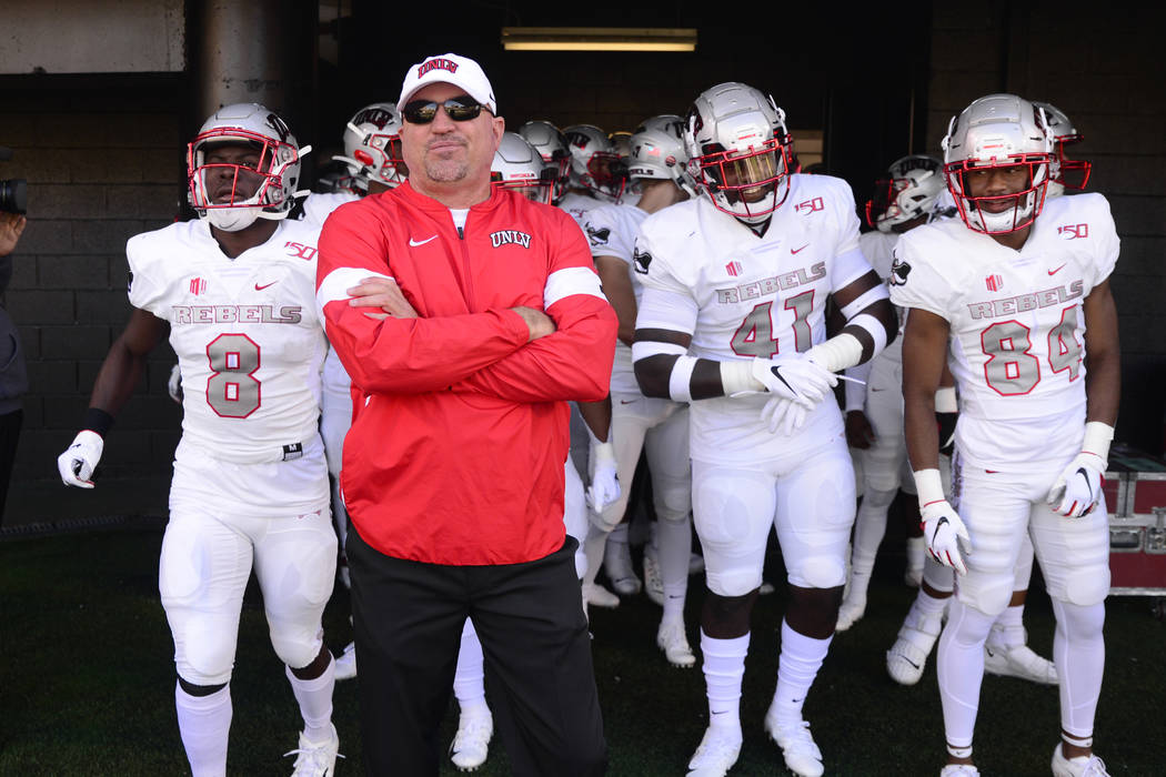 UNLV Head Coach Tony Sanchez prepares to lead his team onto the field against Vanderbilt before ...