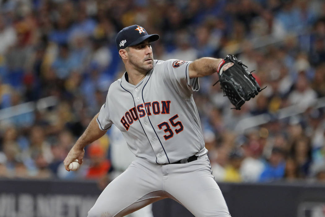 Houston Astros' Justin Verlander pitches against the Tampa Bay Rays in the first inning of Game ...