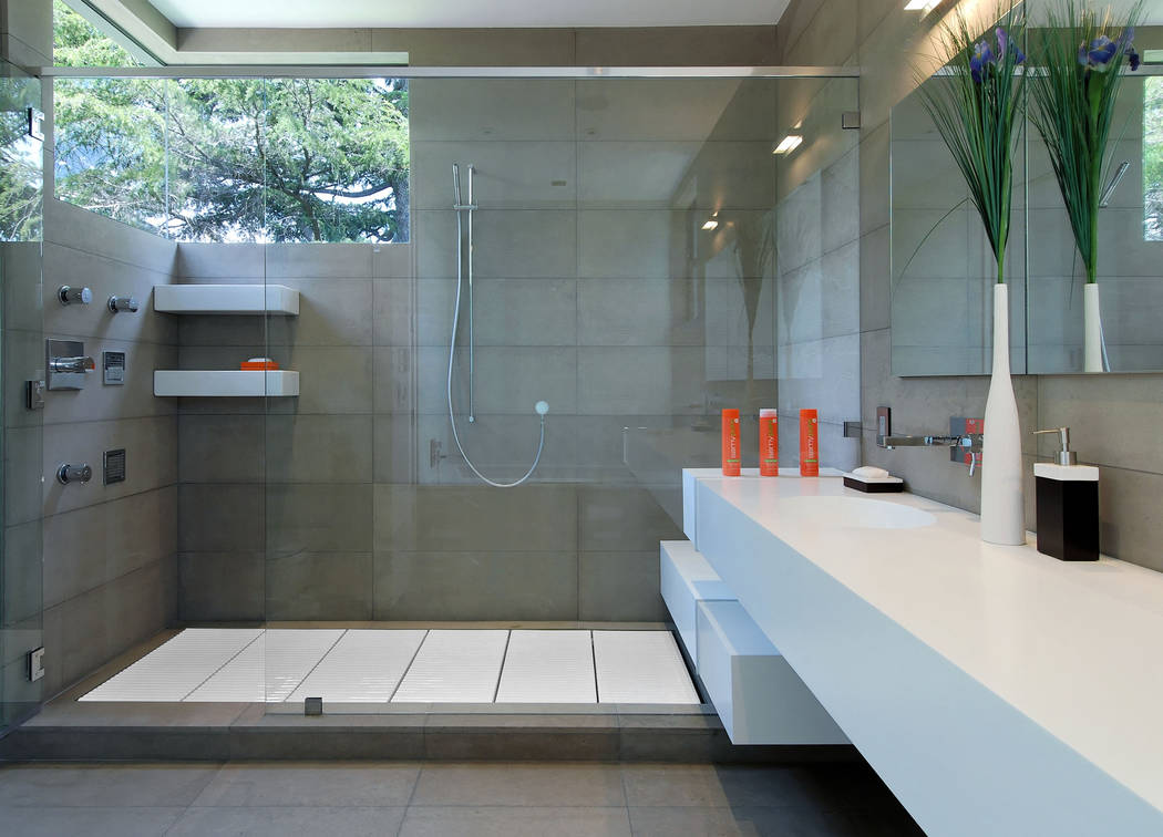 Maydan Architects has used Tatami ceramic removable tiles in bathroom showers. The product is g ...