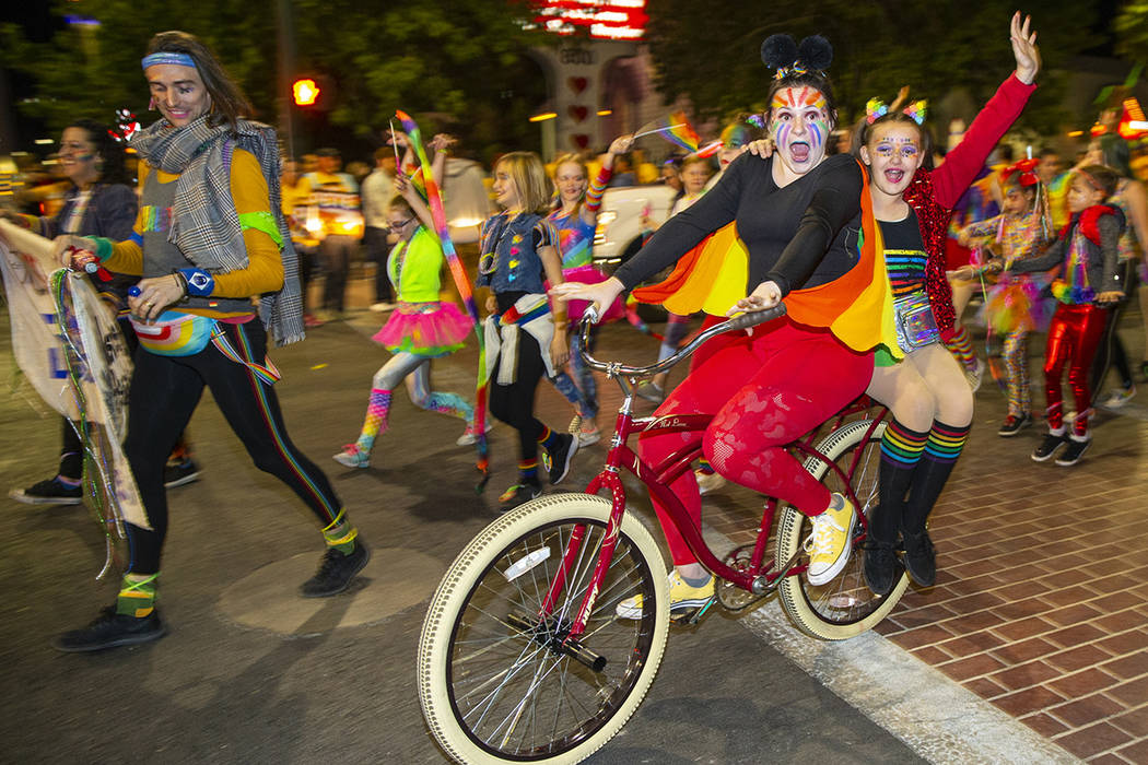 Tandem bicyclists riding in the Pride parade on Friday, Oct. 11, 2019 in Las Vegas. (L.E. Basko ...