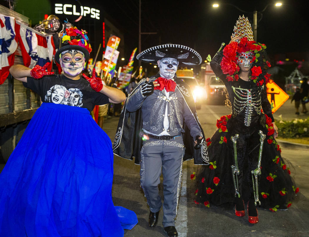 Participants dressed in Day of the Dead costumes march during the annual Las Vegas Pride Night ...