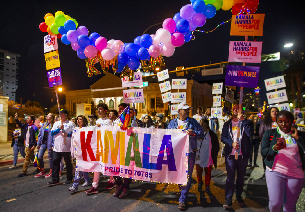 Supporters of Democratic presidential candidate Sen. Kamala Harris, D-Calif., march up S. Fourt ...