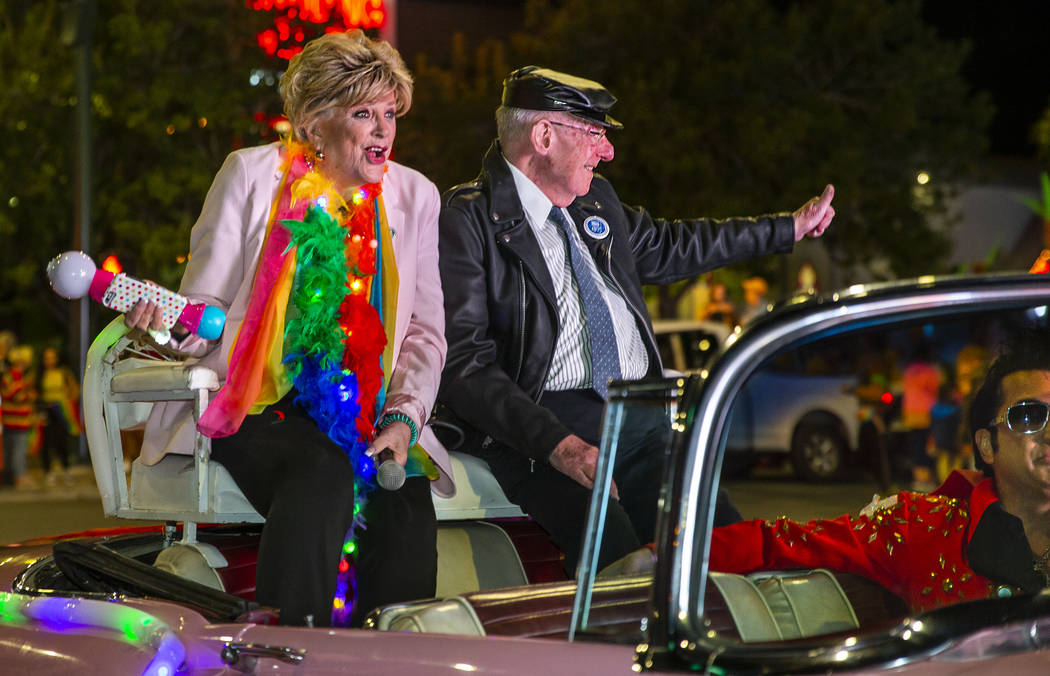 Mayor Carolyn Goodman and her husband, Oscar, ride up S. Fourth Street during the annual Las Ve ...