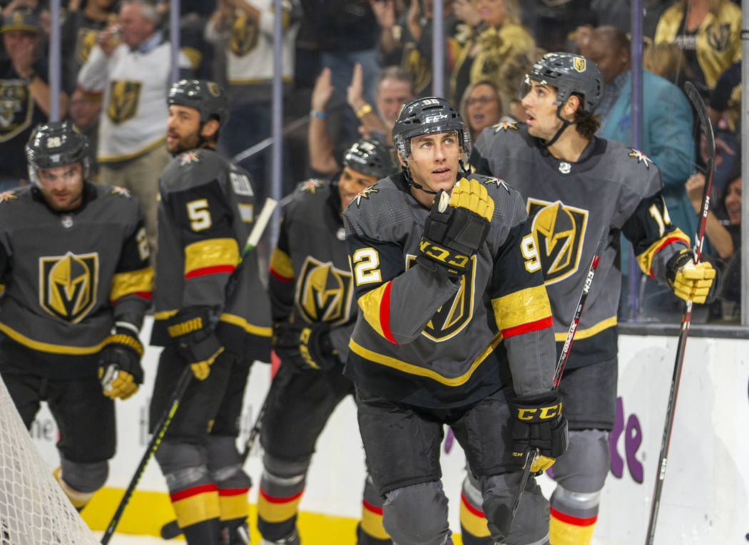 Vegas Golden Knights left wing Tomas Nosek (92, center) thanks the fans after scoring on Calgar ...