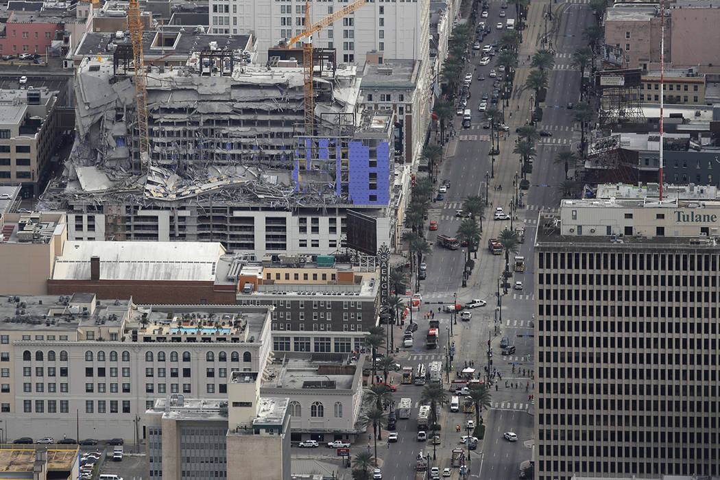 This aerial photo shows the Hard Rock Hotel, which was under construction, after a fatal partia ...