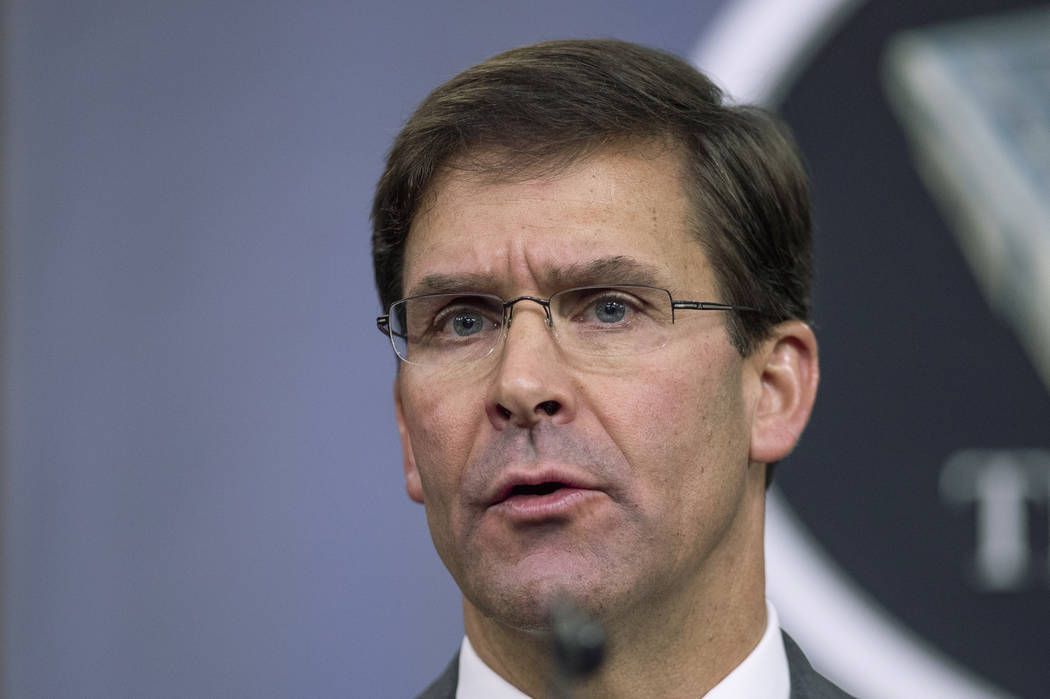 In this Aug. 28, 2019, file photo, Secretary of Defense Mark Esper speaks to reporters during a ...