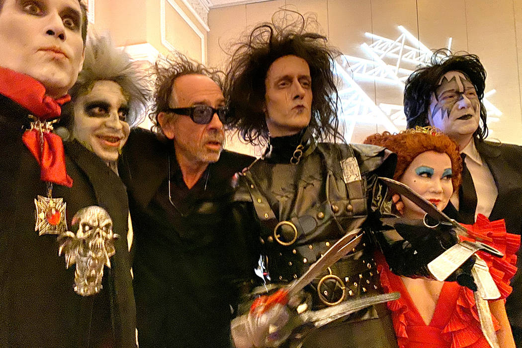 Tim Burton, third from left, poses with, from left, Gary Lewandowski of Los Angeles, Rick Decar ...