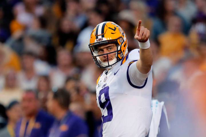 LSU quarterback Joe Burrow (9) warms up before an NCAA college football game against Florida in ...