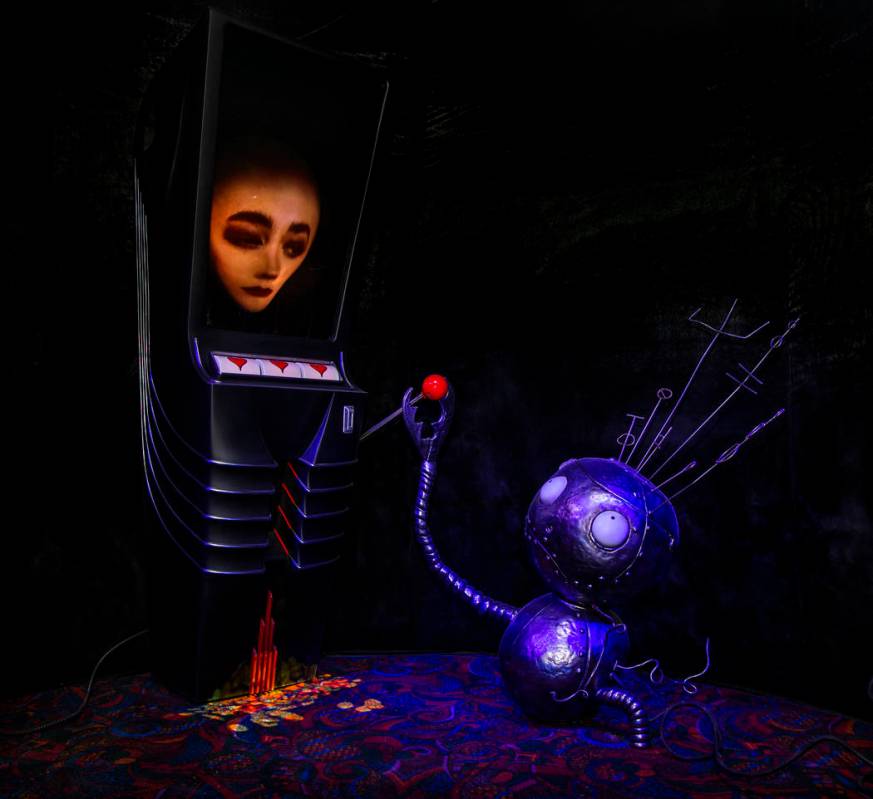 Art piece "Robot Boy and Slot Machine" by Tim Burton in his Lost Vegas art exhibition ...