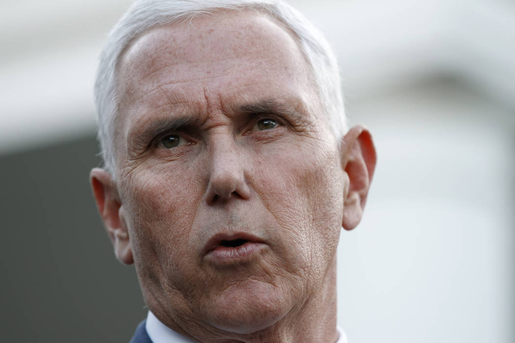 Vice President Mike Pence speaks to reporters outside the West Wing of the White House, Monday, ...