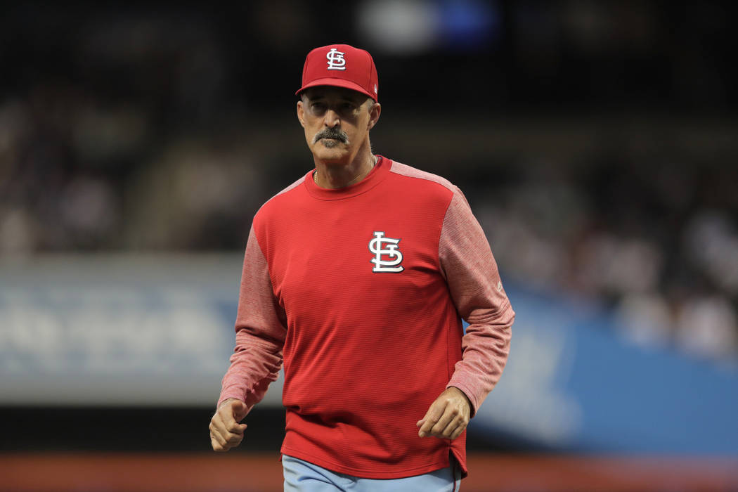 St. Louis Cardinals pitching coach Mike Maddux is seen on the field after a meeting with starti ...