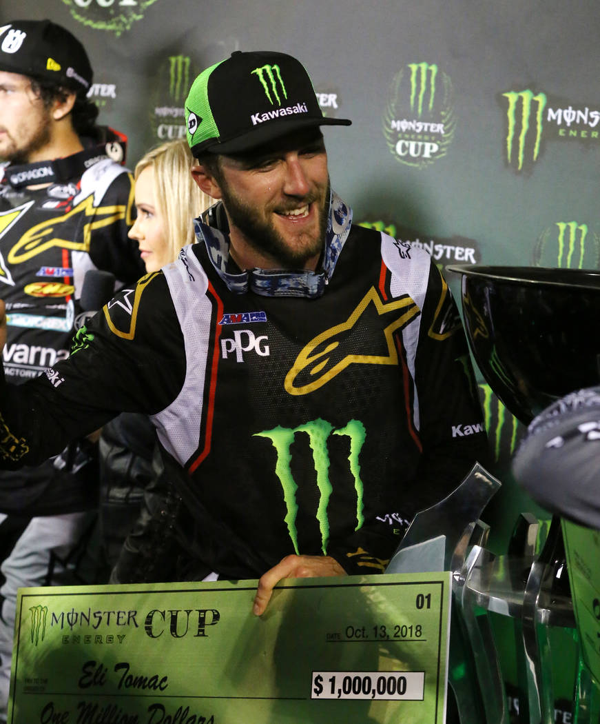 Eli Tomac celebrates his win in the 2018 Monster Energy Cup Race at Sam Boyd Stadium on Saturda ...