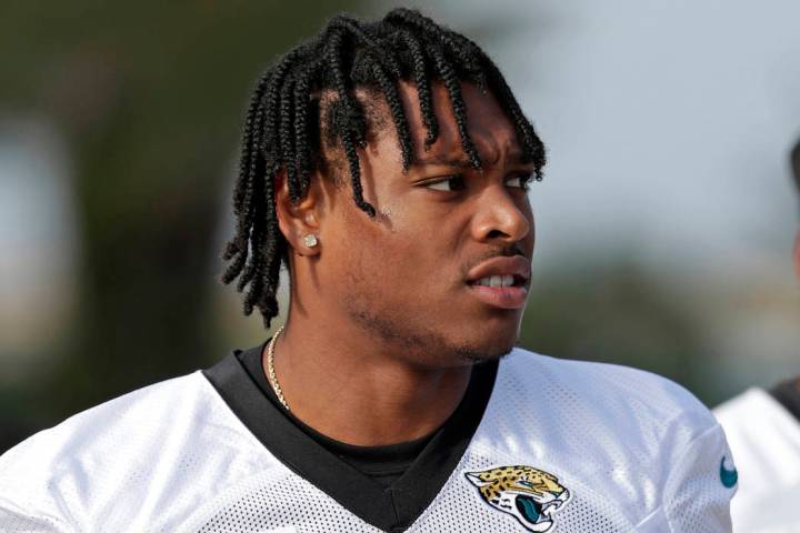 FILE - In this June 11, 2019, file photo, Jacksonville Jaguars cornerback Jalen Ramsey walks to ...