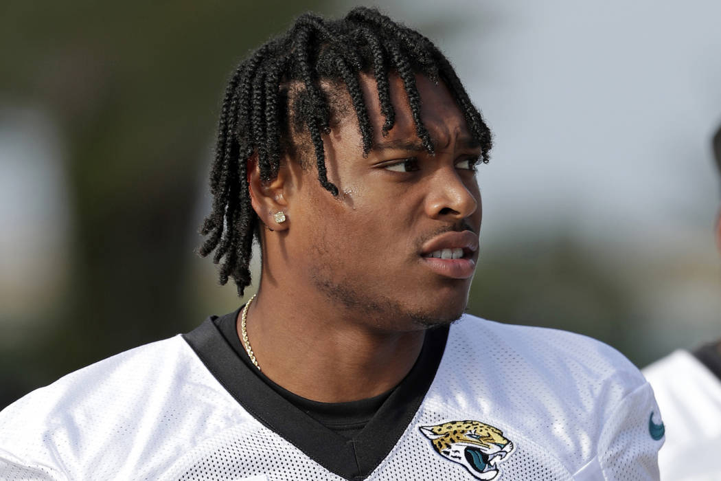 FILE - In this June 11, 2019, file photo, Jacksonville Jaguars cornerback Jalen Ramsey walks to ...