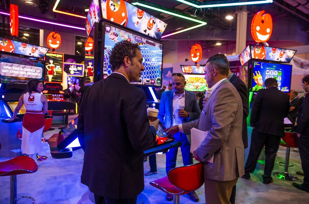 Attendees stream into the Gamblit Gaming exhibition during the Global Gaming Expo 2019 at the S ...