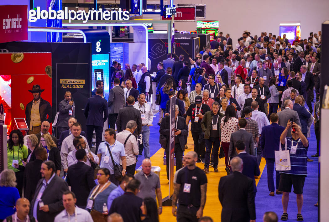 Attendees stream about the exhibition area floor during the Global Gaming Expo 2019 at the Sand ...