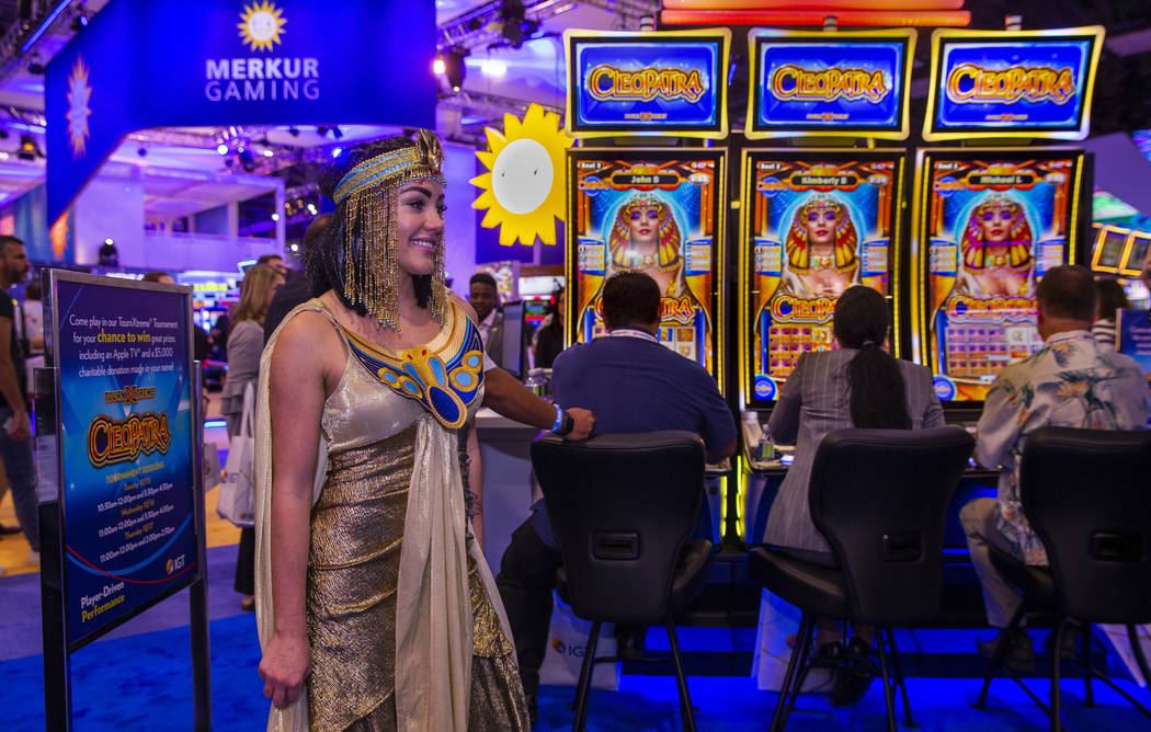 Cleopatra is on hand as attendees play the game on display in the IGT exhibition space during t ...