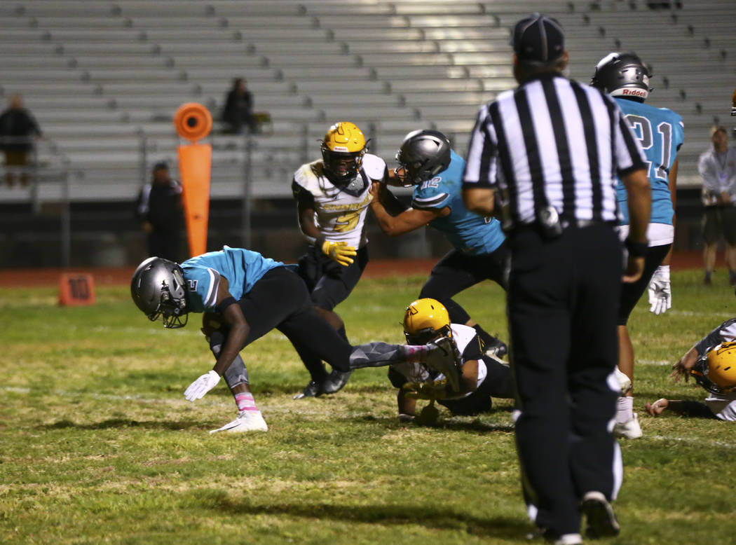 Silverado's Aginae Cunningham (2) scores a touchdown against Clark during the second half of a ...