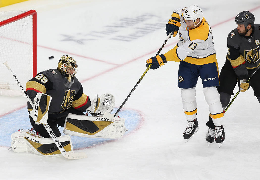 Nashville Predators center Nick Bonino (13) scores a goal against Vegas Golden Knights goaltend ...