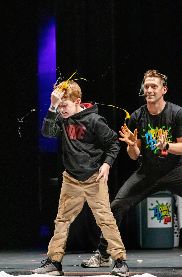 Cracking an egg on one's forehead is one of the games in "Double Dare Live!" (The Smith Center)