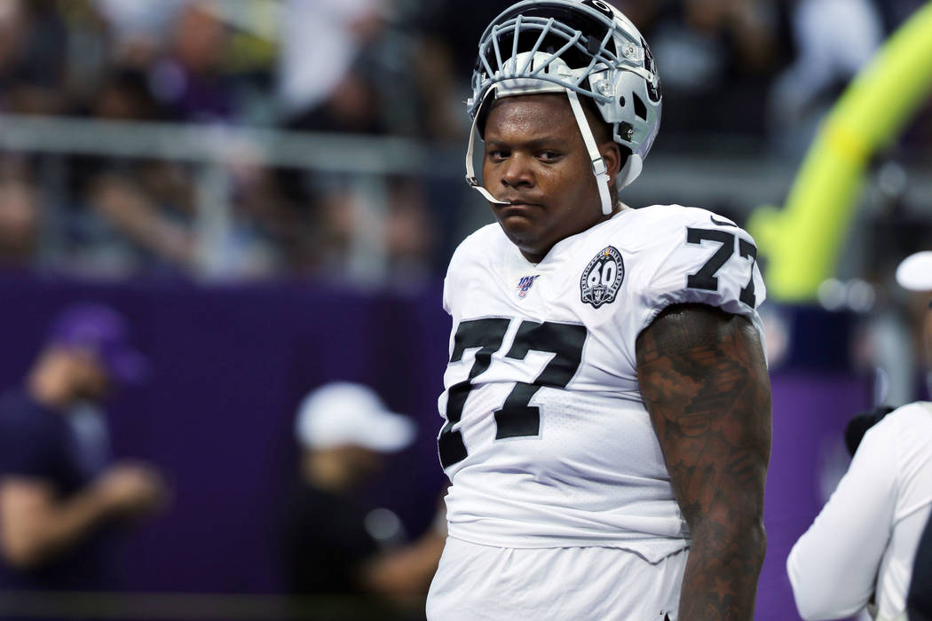 Oakland Raiders offensive tackle Trent Brown (77) walks off the field following warm ups prior ...