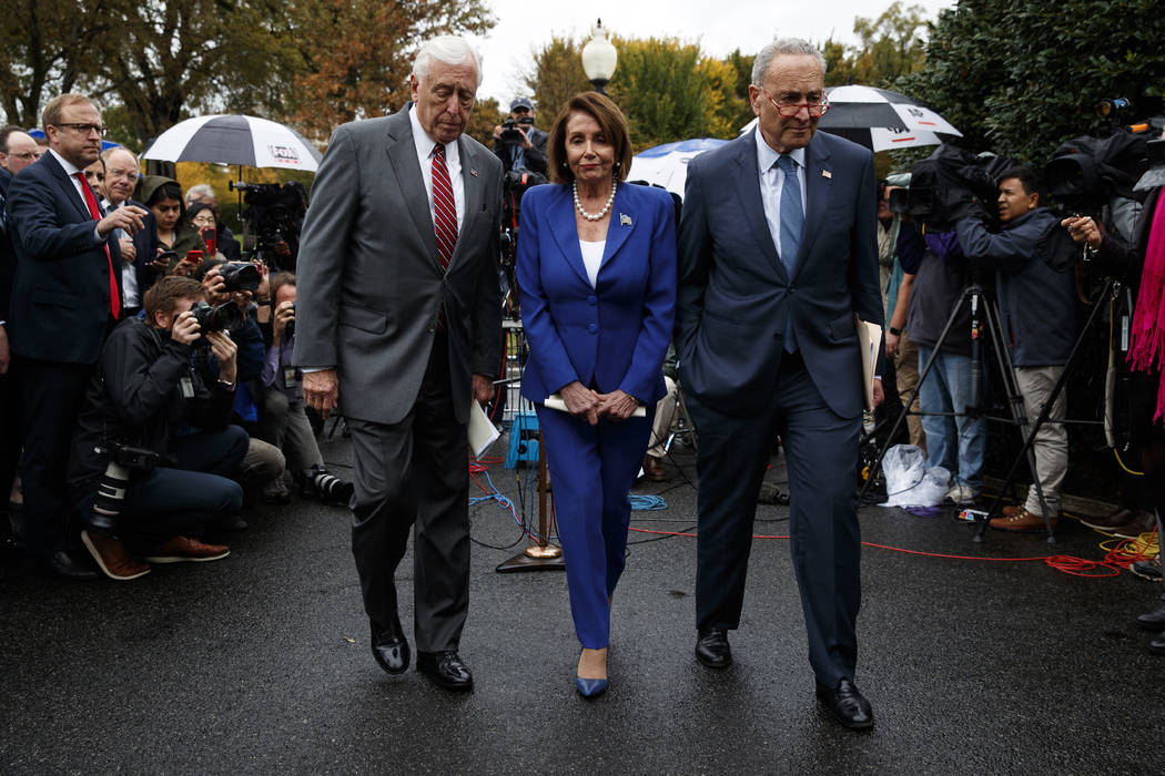 Speaker of the House Nancy Pelosi of Calif., center, Senate Minority Leader Sen. Chuck Schumer ...