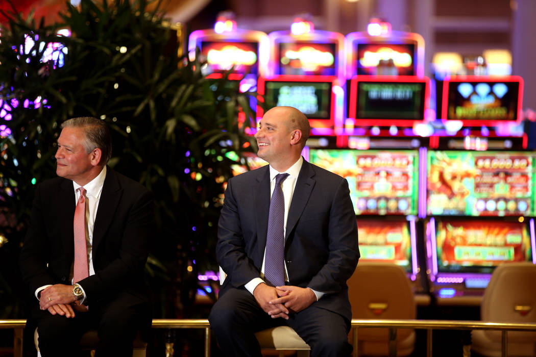 Robert DeSalvio, president of Encore Boston Harbor, left, and Wynn Resorts CEO Matt Maddox duri ...