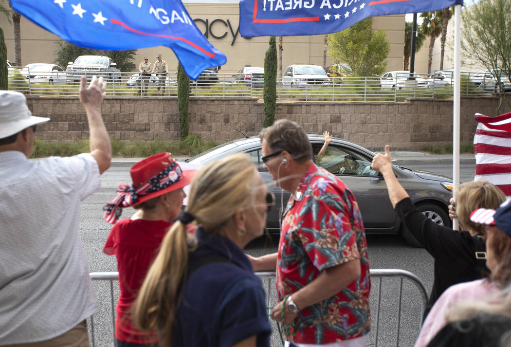 A vehicle waves at the March for Trump on Thursday, Oct. 17, 2019, in Las Vegas. (Ellen Schmidt ...