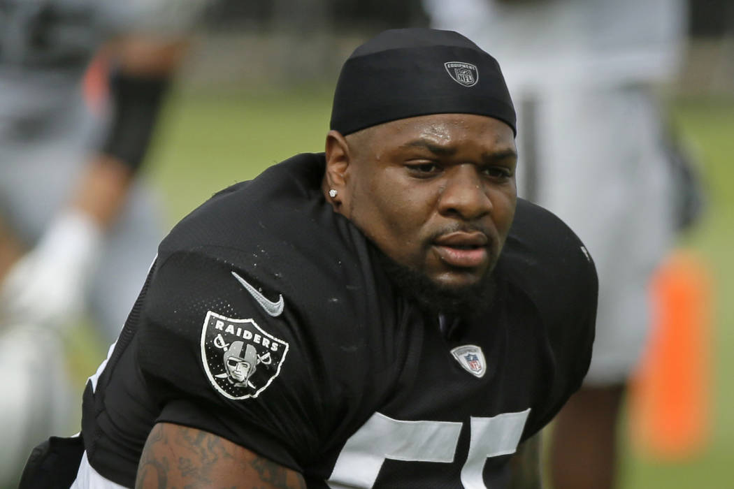 FILE - In this July 29, 2019, file photo, Oakland Raiders linebackers Vontaze Burfict gets up a ...