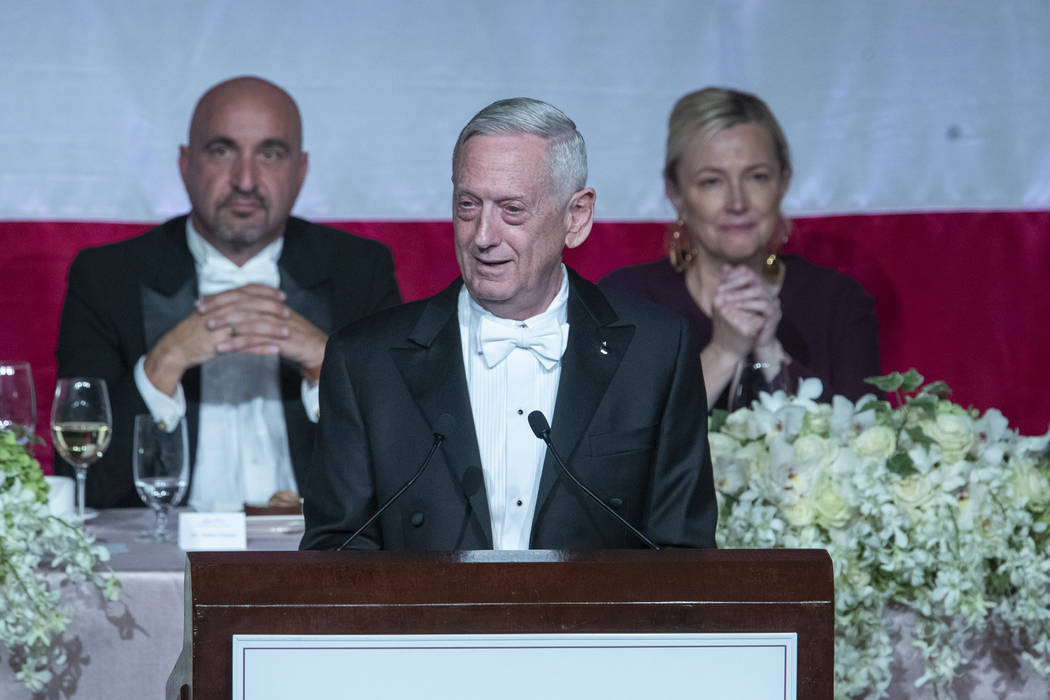 Former U.S. Secretary of Defense Jim Mattis, center, delivers the keynote address during the 74 ...