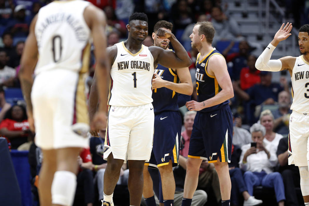 New Orleans Pelicans forward Zion Williamson (1) reacts after scoring a basket against the Utah ...