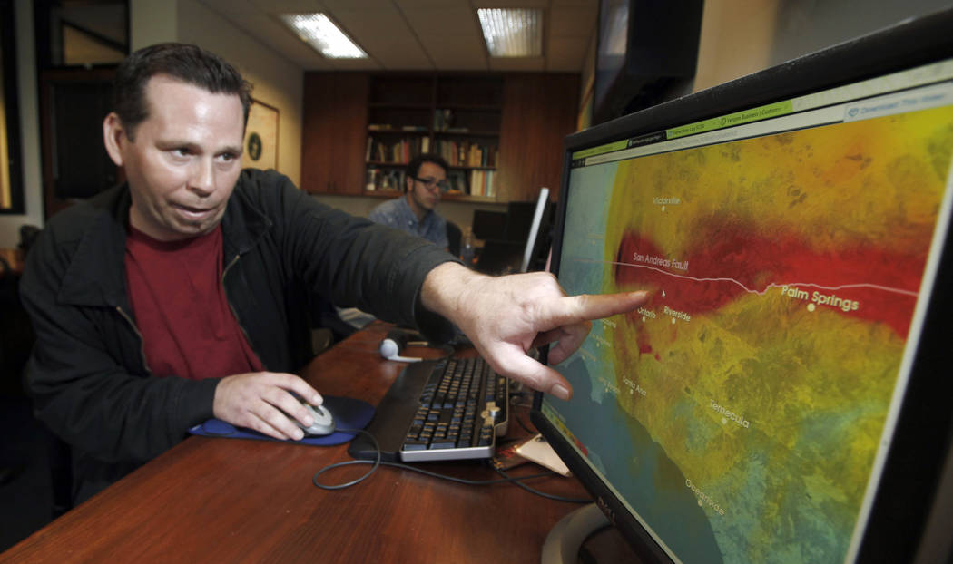 This Sept. 13, 2011 photo shows Anthony Guarino Jr., a seismic analyst at the California Instit ...