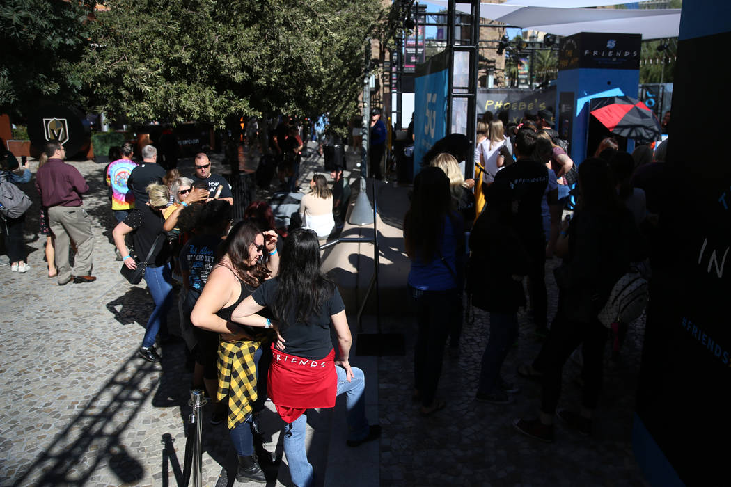 People wait in line for the “Friends” Fan Experience at New York-New York in Las Vegas, Sat ...