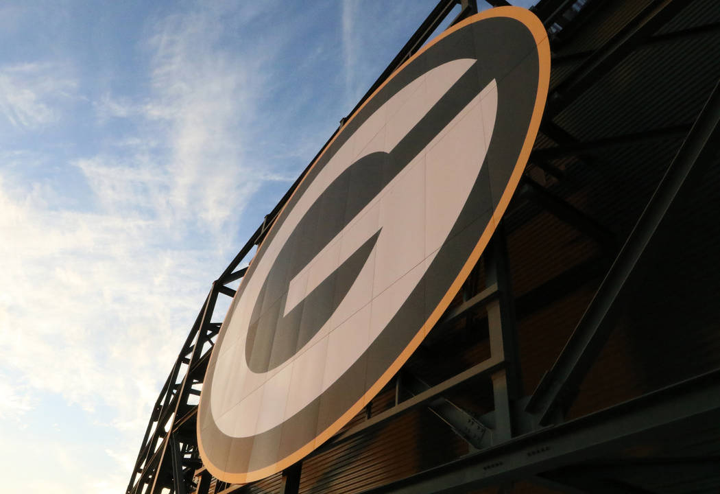 The Green Bay Packers NFL logo at the top of Lambeau Field in Green Bay, Wis., Friday, Oct. 18, ...