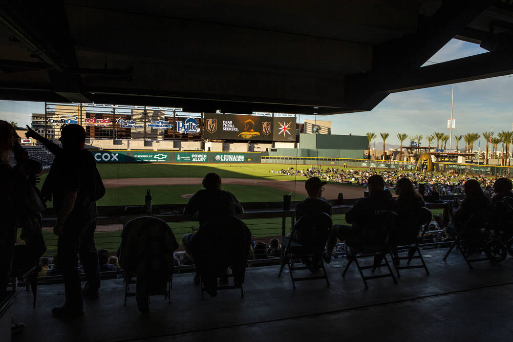 Fans relax about the field during the first Vegas Golden Knights watch party as they take on th ...