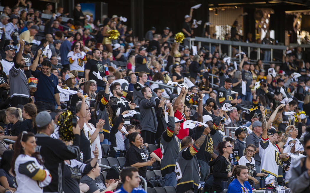 Fans celebrate a goal during the first Vegas Golden Knights watch party as they take on the Pit ...