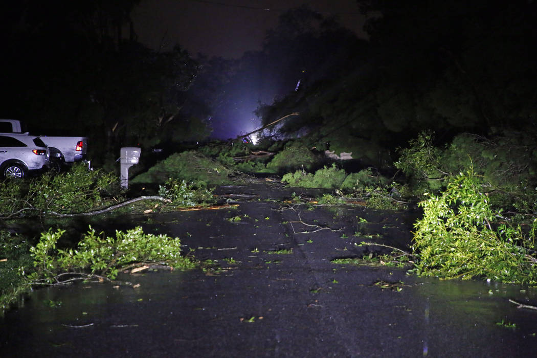 Downed power lines, trees damage homes as Tropical Storm Nestor passed the area on Saturday, Oc ...