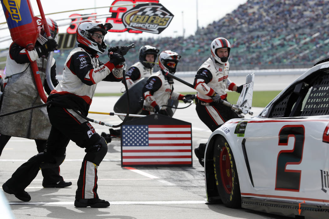 Brad Keselowski (2) pits during a NASCAR Cup Series auto race at Kansas Speedway in Kansas City ...